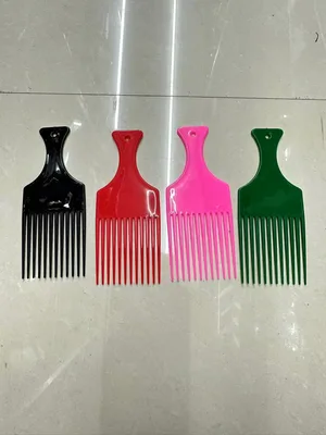 מסרק לשיער מתולתל/מקורזל מפלסטיק קשיח