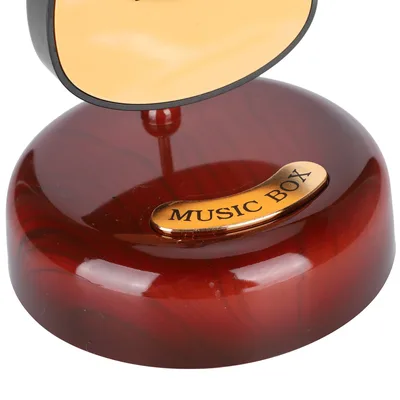 תיבת נגינה גיטרה קלאסית מסתובבת – עיצוב פרימיום וצלילים מרגיעים