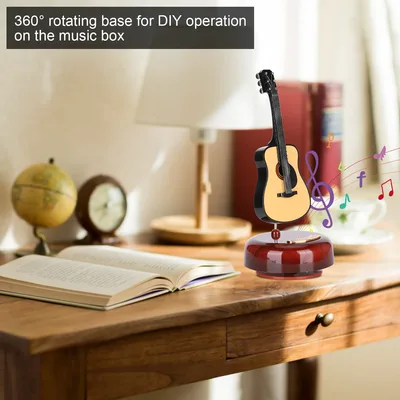 תיבת נגינה גיטרה קלאסית מסתובבת – עיצוב פרימיום וצלילים מרגיעים