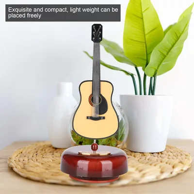 תיבת נגינה גיטרה קלאסית מסתובבת – עיצוב פרימיום וצלילים מרגיעים