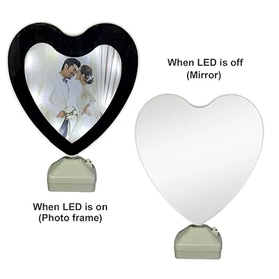 מראת קסם בצורת לב עם תאורת LED – מראה שהופכת למסגרת תמונה מרגשת